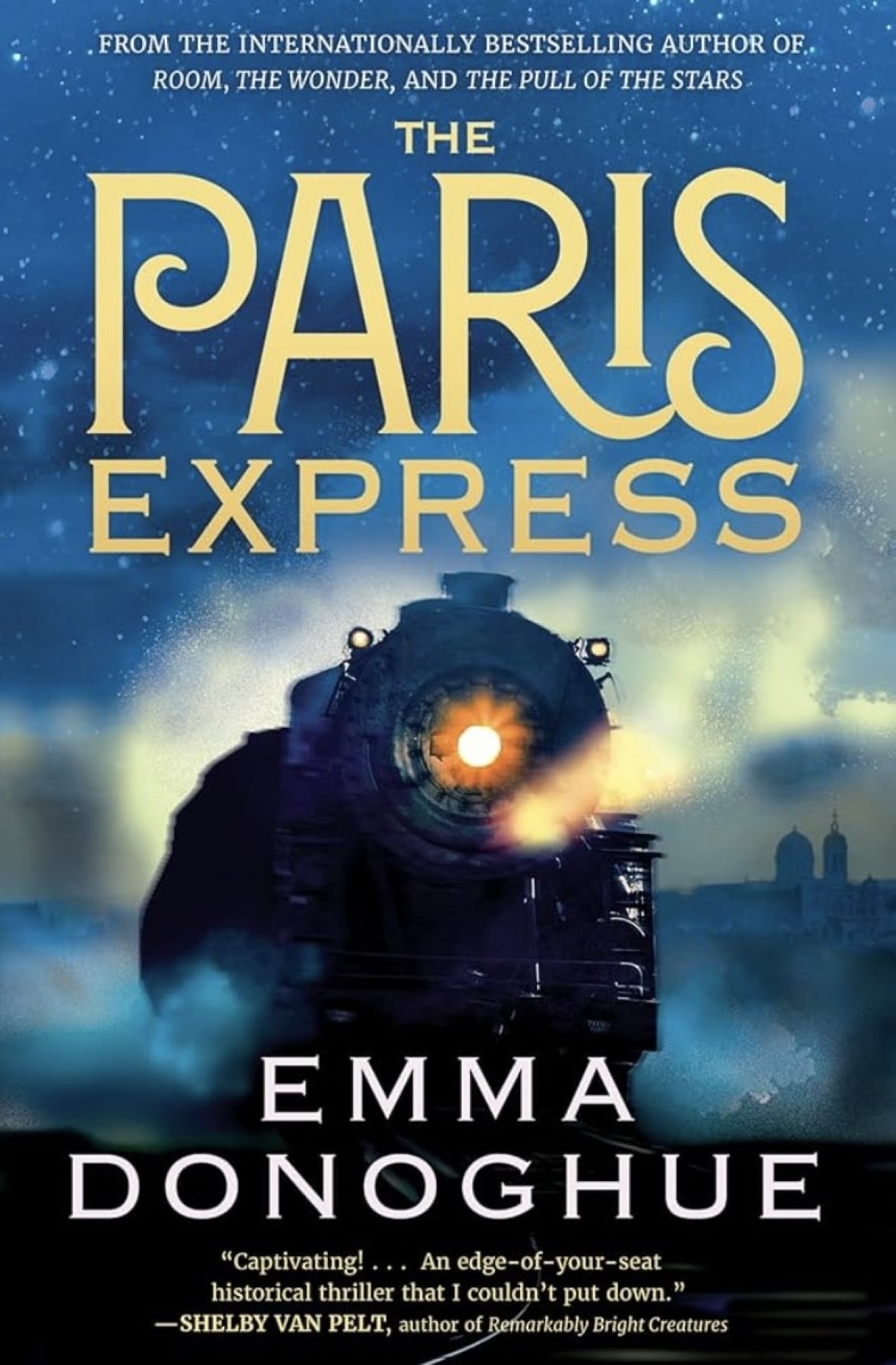 A picture of a train in the dark. 