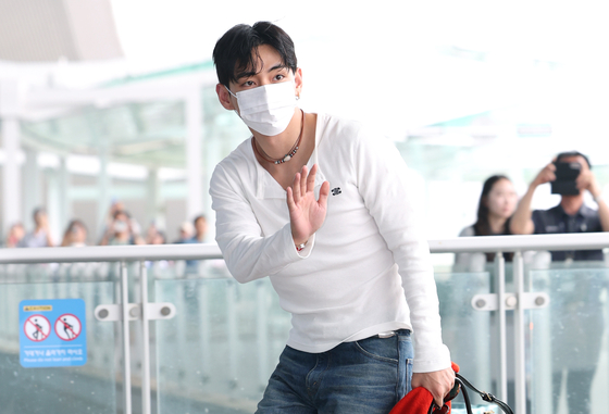 BTS member V arrives at Incheon International Airport to leave the country for overseas schedule on July 4. [NEWS1] 