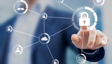 A person pointing to a digital image of a lock connected to other digital icons.