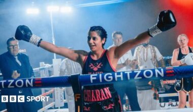 Charan Kaur Dhesi celebrating her pro debut win over Amy Greatorex