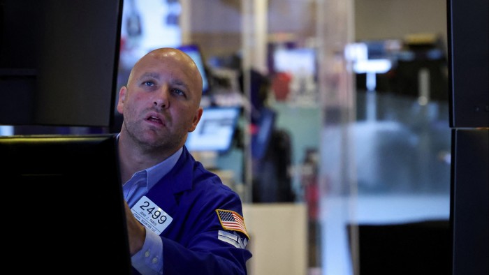 Trader on floor of New York Stock Exchange