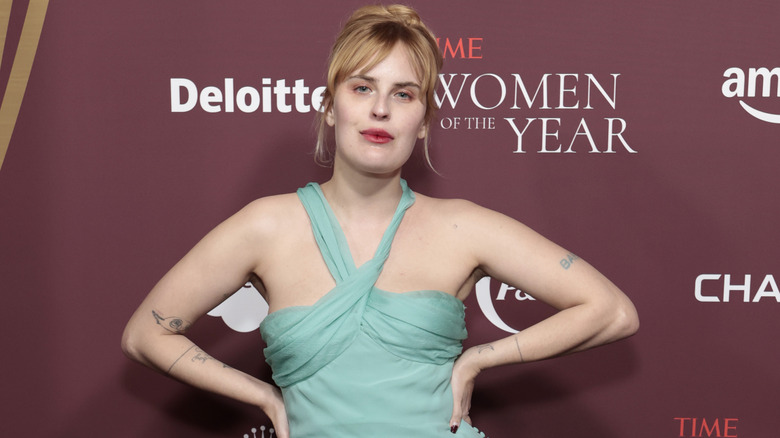 Tallulah Willis posing in a teal dress