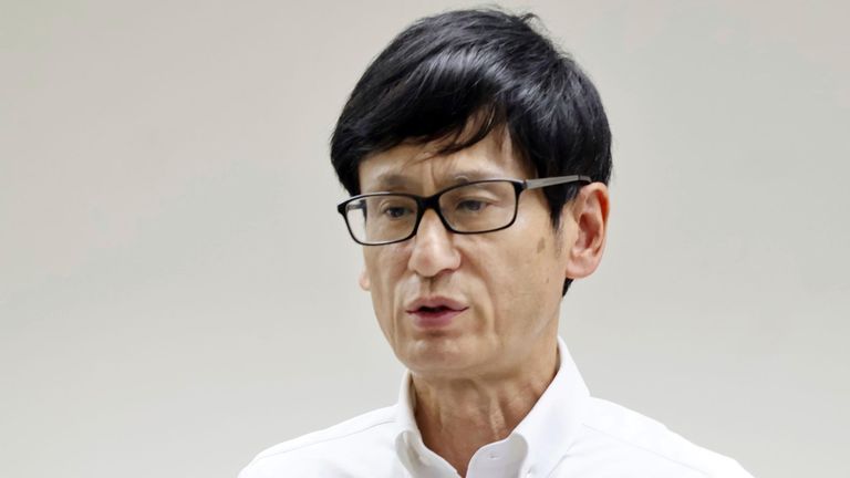 Tsuyoshi Yasukochi, executive secretary of the Japan Boxing Commission, speaks at a press conference on Sunday