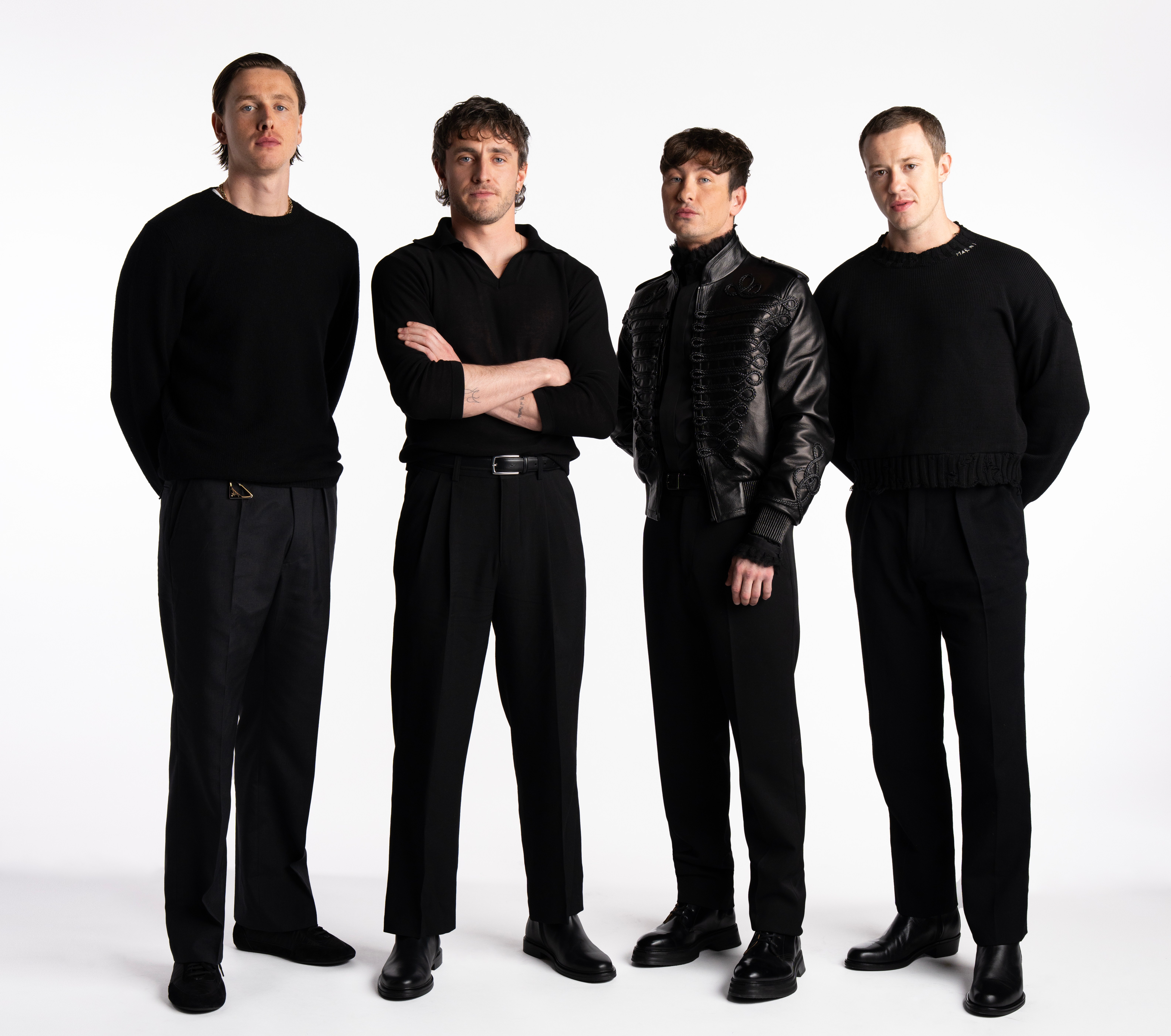 Photo of four actors portraying the Beatles in upcoming biopics.