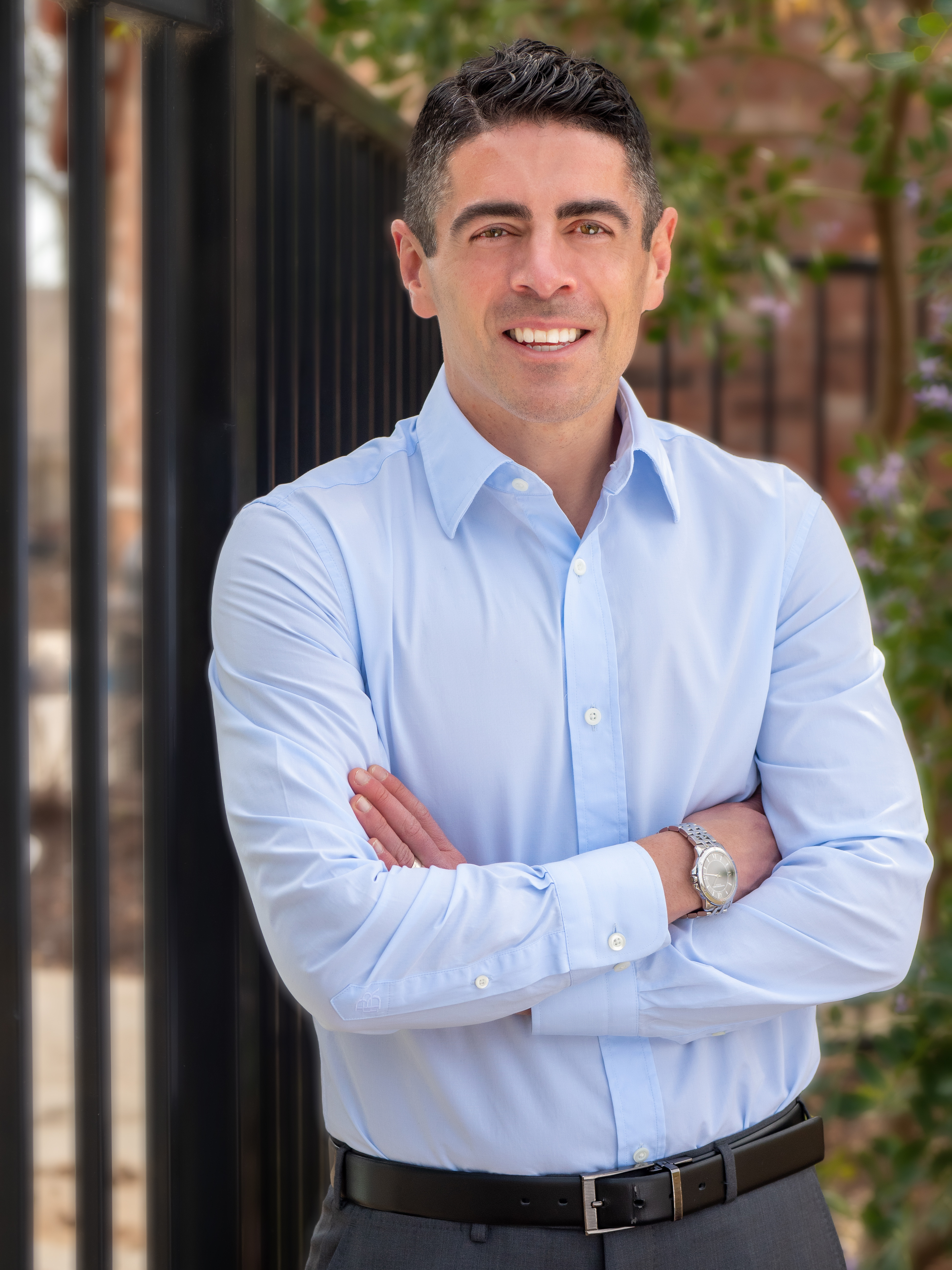 Dr. Bryce Appelbaum smiling with arms crossed.