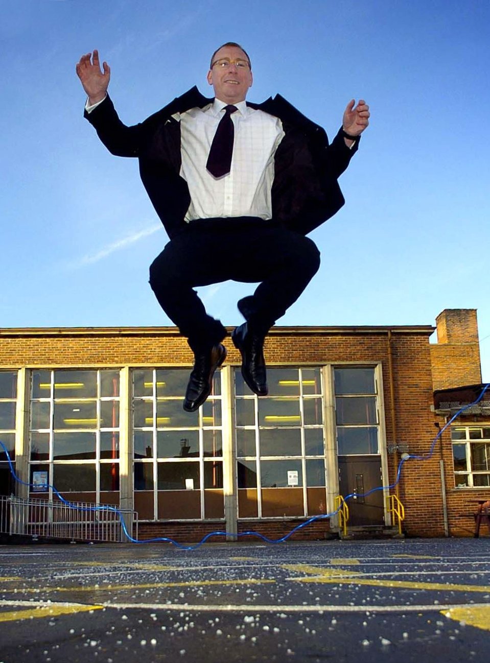 Benny Higgins, Royal Bank of Scotland chief executive, jumping rope at his former primary school.