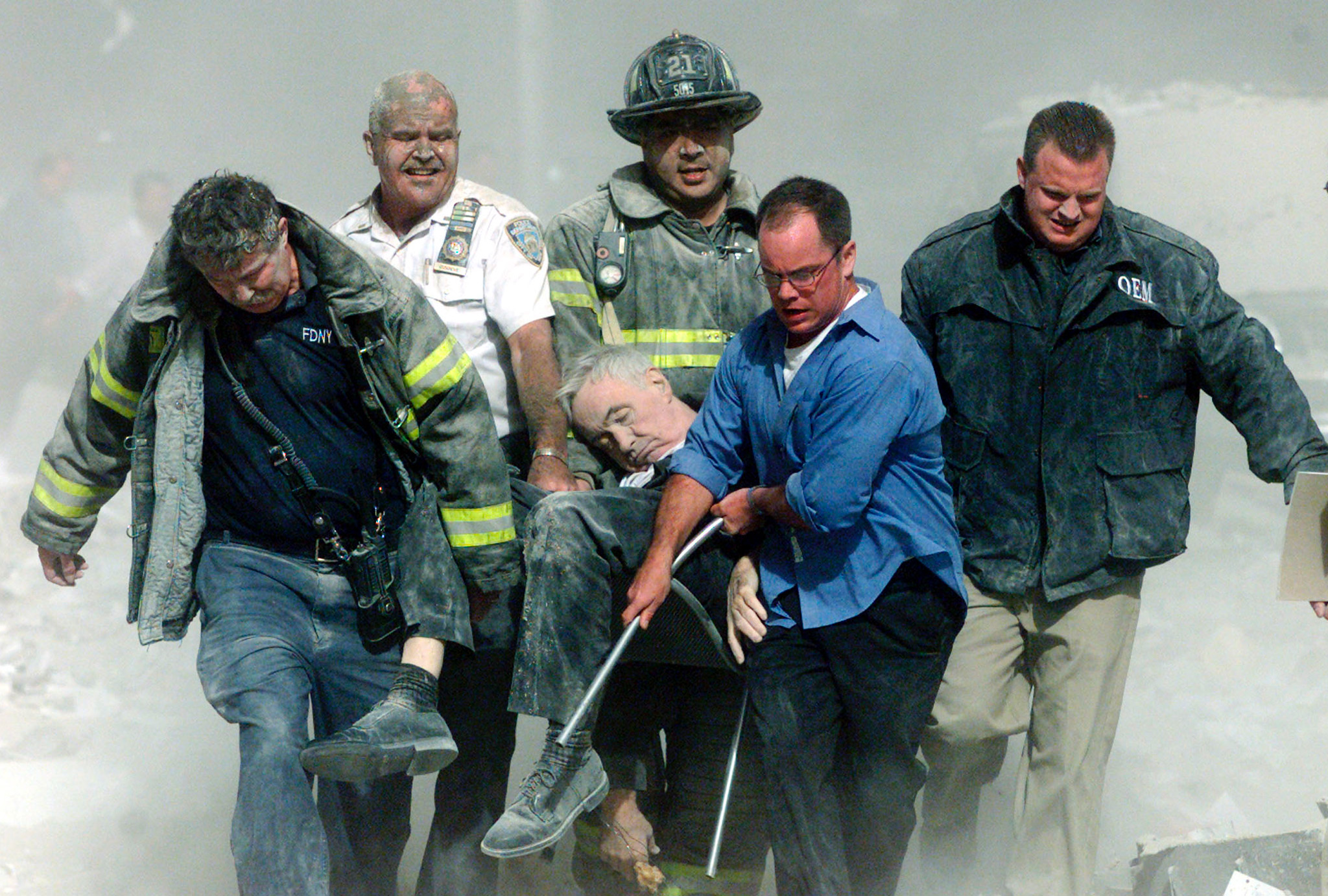 FIRE DEPARTMENT CHAPLAIN CARRIED FROM WORLD TRADE CENTER.