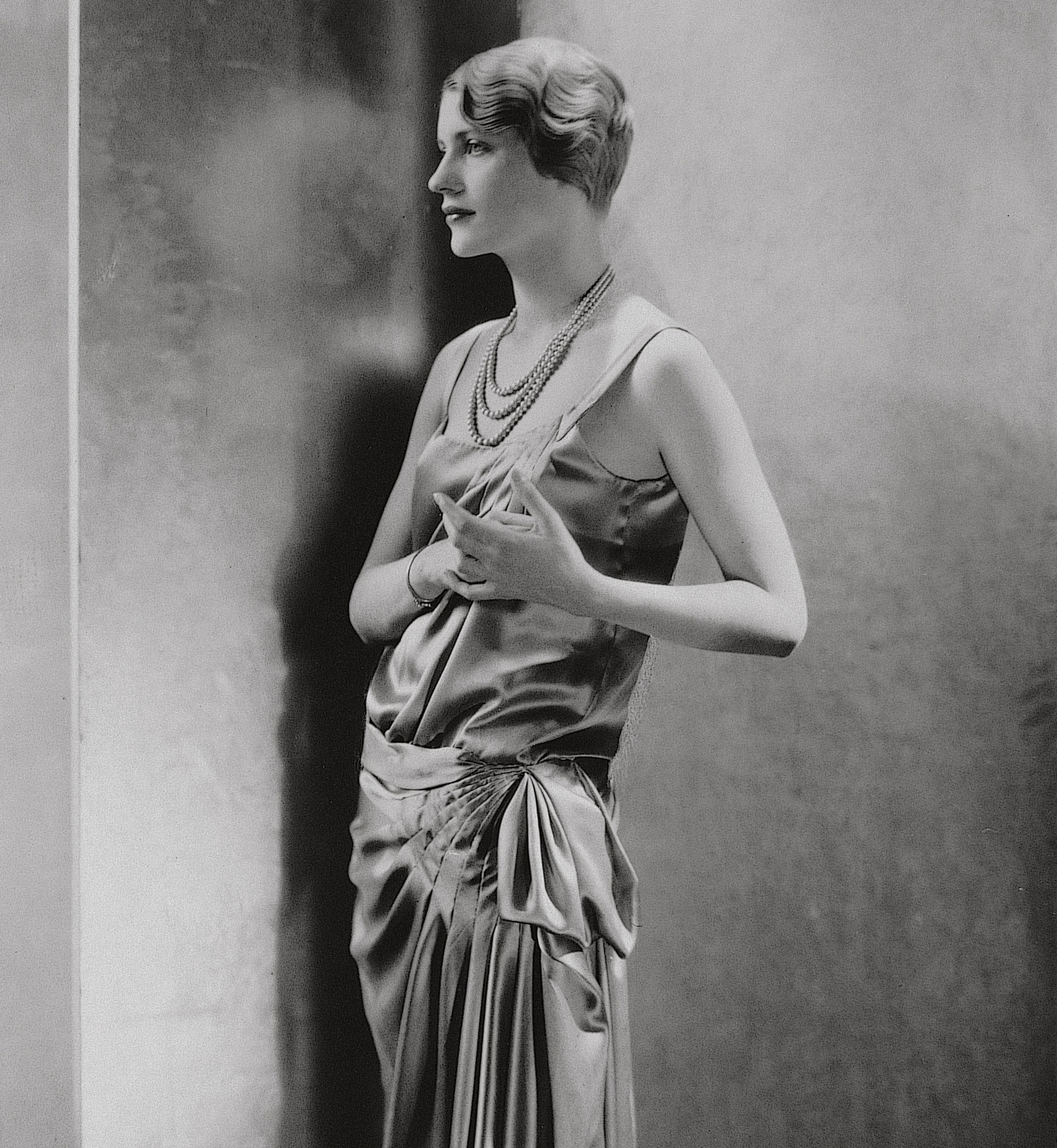 Black and white portrait photograph of Lee Miller in New York City.