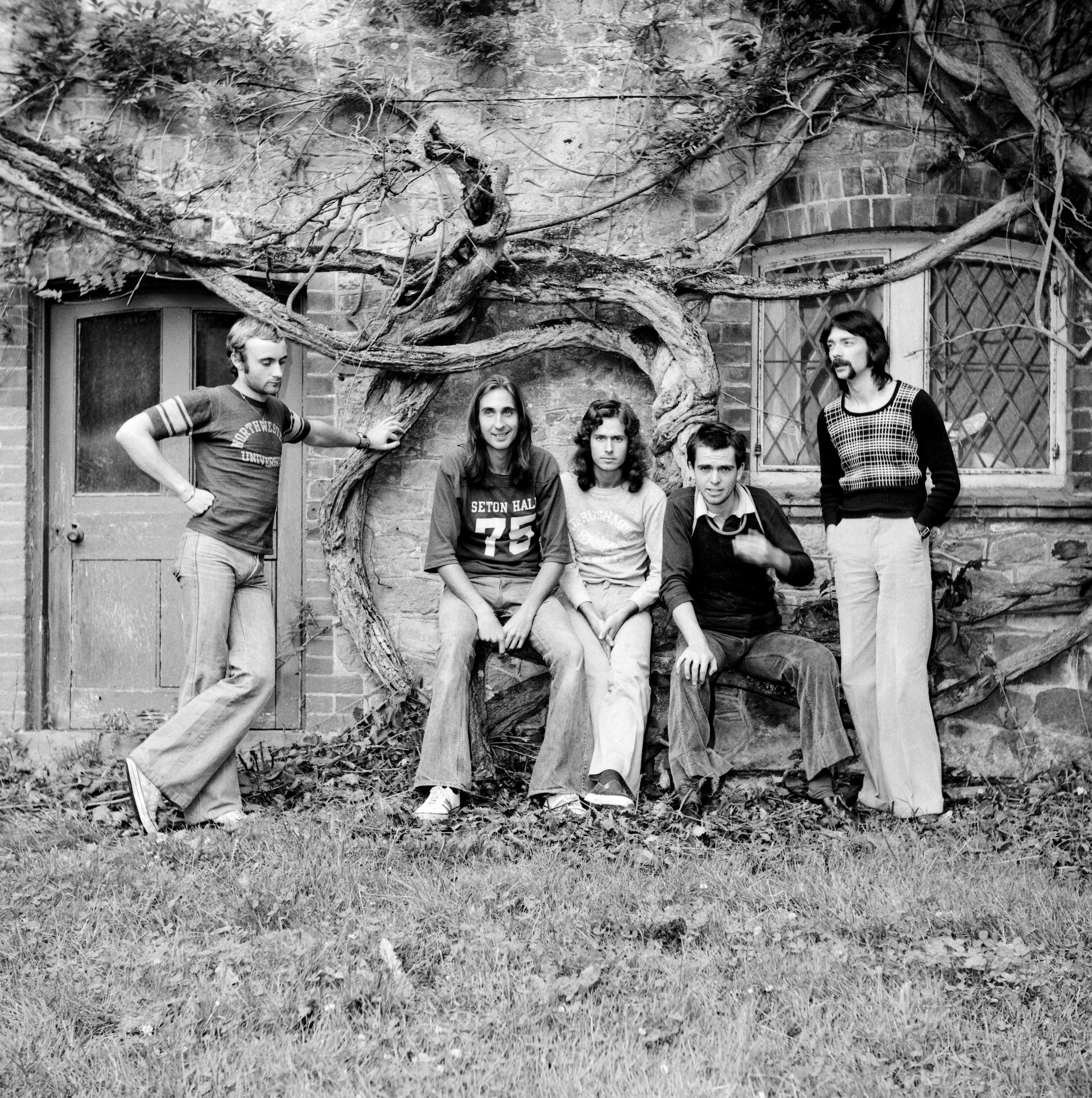 Genesis band members posing for a photo in 1974.