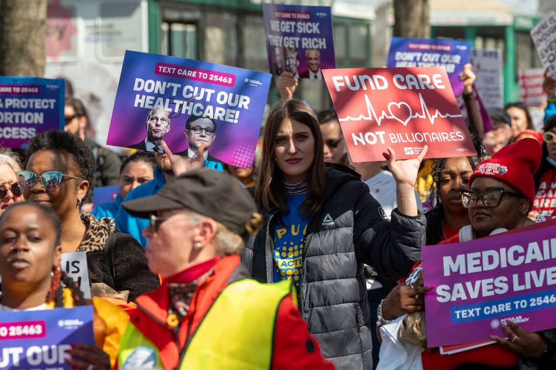 Members of the grassroots activist organization Popular Democracy march to demand no cuts to Medicaid and lower prescription drug prices in Washington, DC, on March 12.