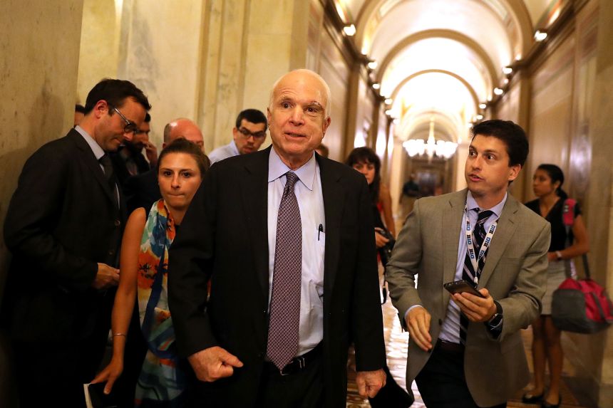Sen. John McCain leaves the Senate chamber on July 28, 2017 after voting against a GOP bill that would repeal Obamacare. He was one of three Senate Republicans who joined with Democrats to kill the bill.