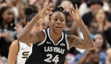 Las Vegas Aces guard Jewell Loyd (24) reacts after scoring a 3-point basket against the Chicago Sky during the second half of a WNBA basketball game Tuesday, Sept. 9, 2025, in Las Vegas. Loyd scored her 6,000th career point during the game. (Steve Marcus/Las Vegas Sun via AP)