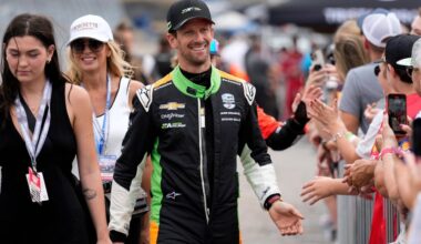 FILE -Romain Grosjean greets fans before an IndyCar auto race, Sept. 15, 2024, at the Nashville Superspeedway in Lebanon, Tenn. (AP Photo/Mark Humphrey, File)