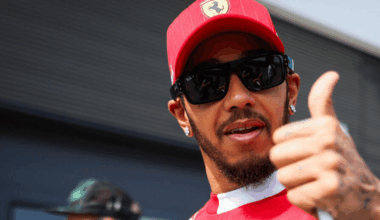 Thumbs up in Ferrari team attire.