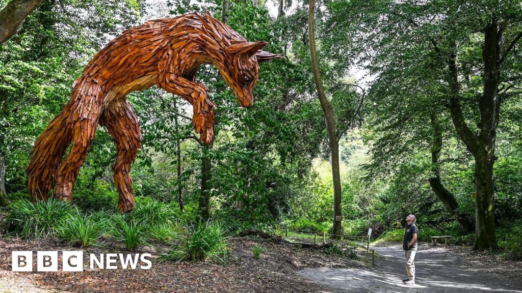 Cornwall gardens turn storm-felled tree into pouncing fox sculpture