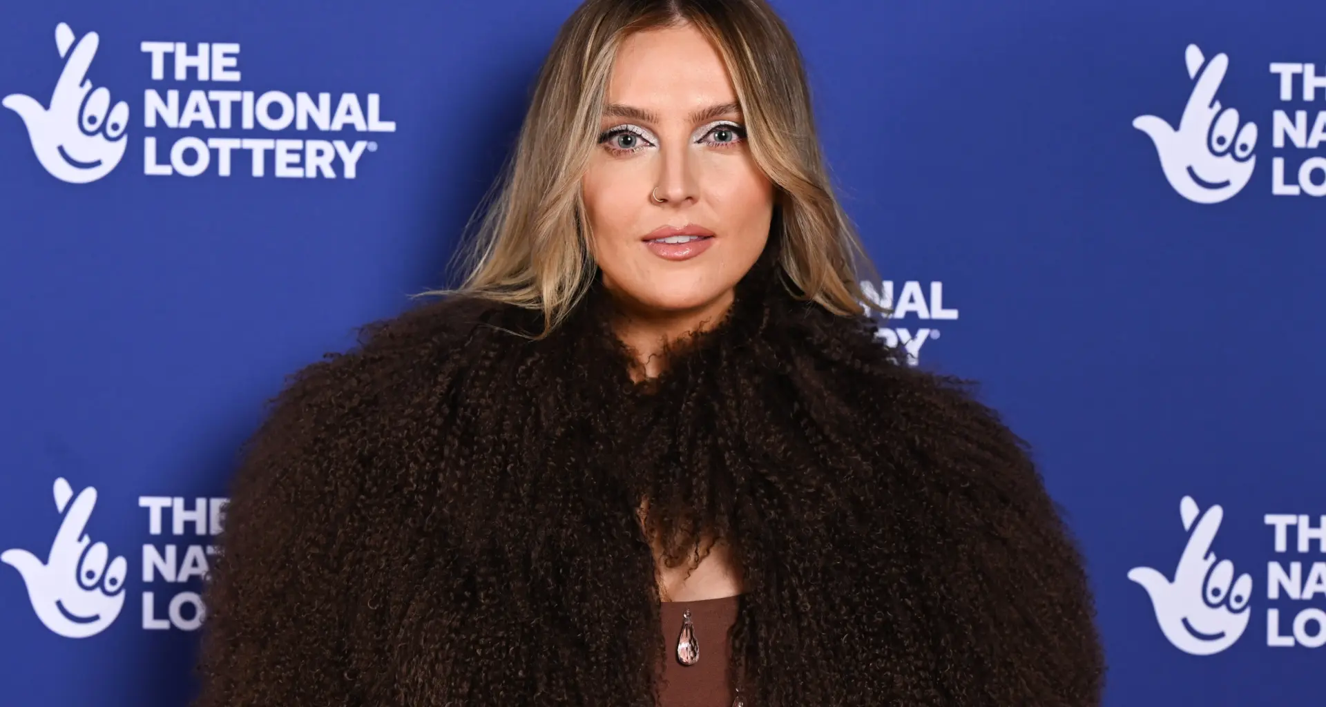 LONDON, ENGLAND - DECEMBER 04: Perrie Edwards attends The National Lottery New Year's Eve Big Bash 2024 at OVO Arena Wembley on December 04, 2024 in London, England. (Photo by Jeff Spicer/Getty Images for The National Lottery)