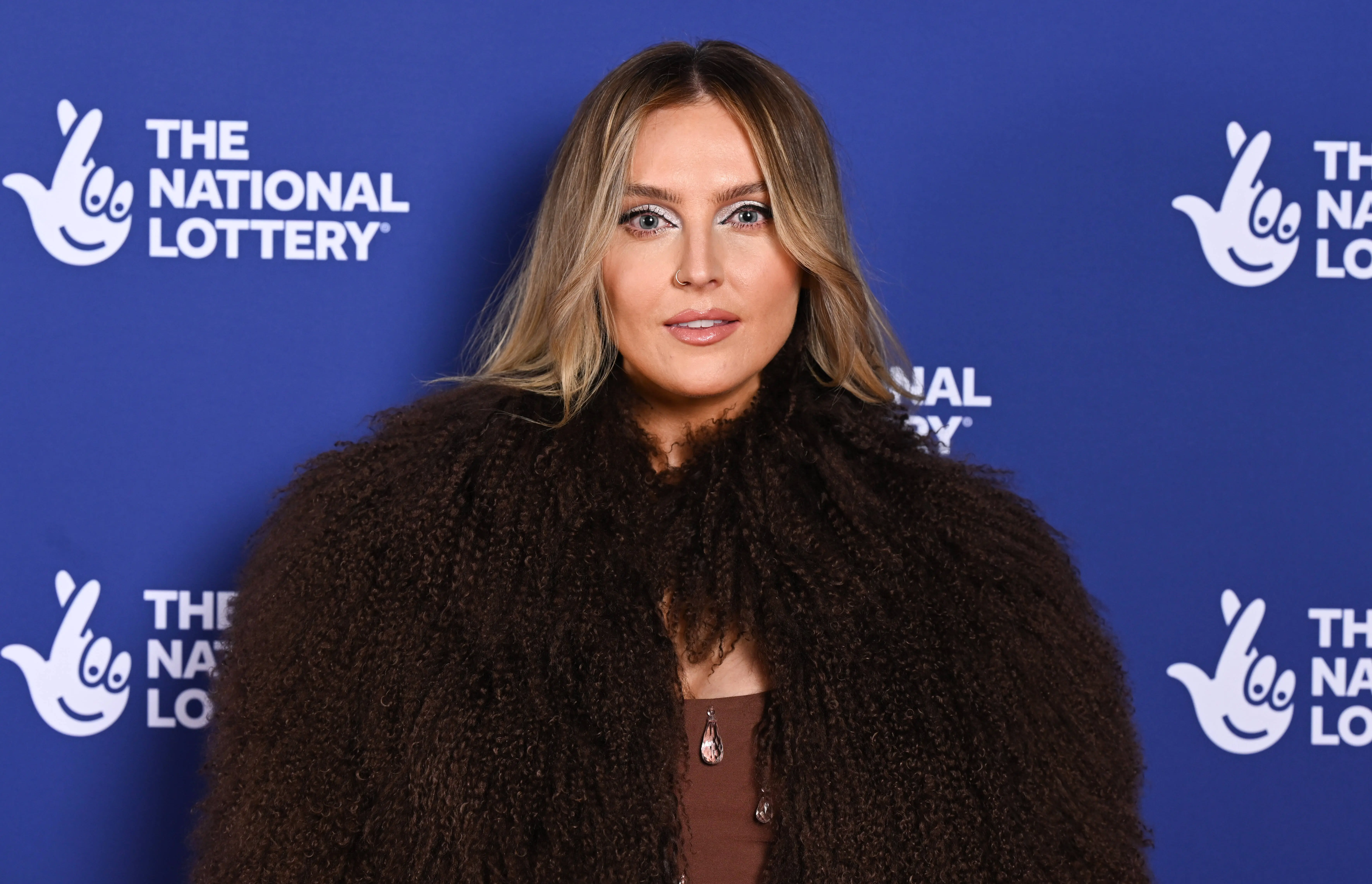 LONDON, ENGLAND - DECEMBER 04: Perrie Edwards attends The National Lottery New Year's Eve Big Bash 2024 at OVO Arena Wembley on December 04, 2024 in London, England. (Photo by Jeff Spicer/Getty Images for The National Lottery)