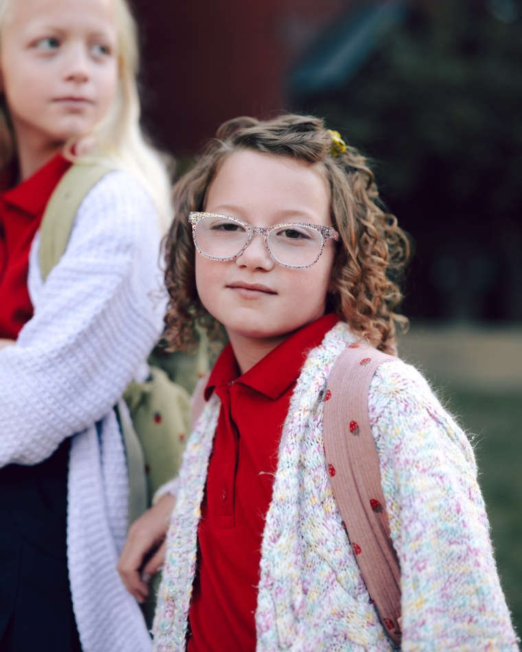 Penelope and Lucy Pratt pose for a portrait