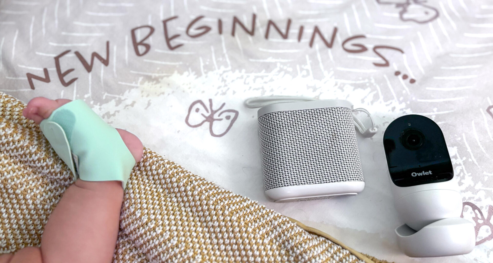 Three baby gadgets in a crib.