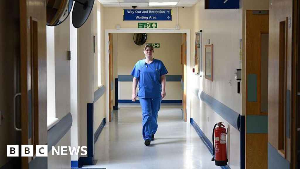 Hospitals warn staff under pressure as NHS waiting lists rise