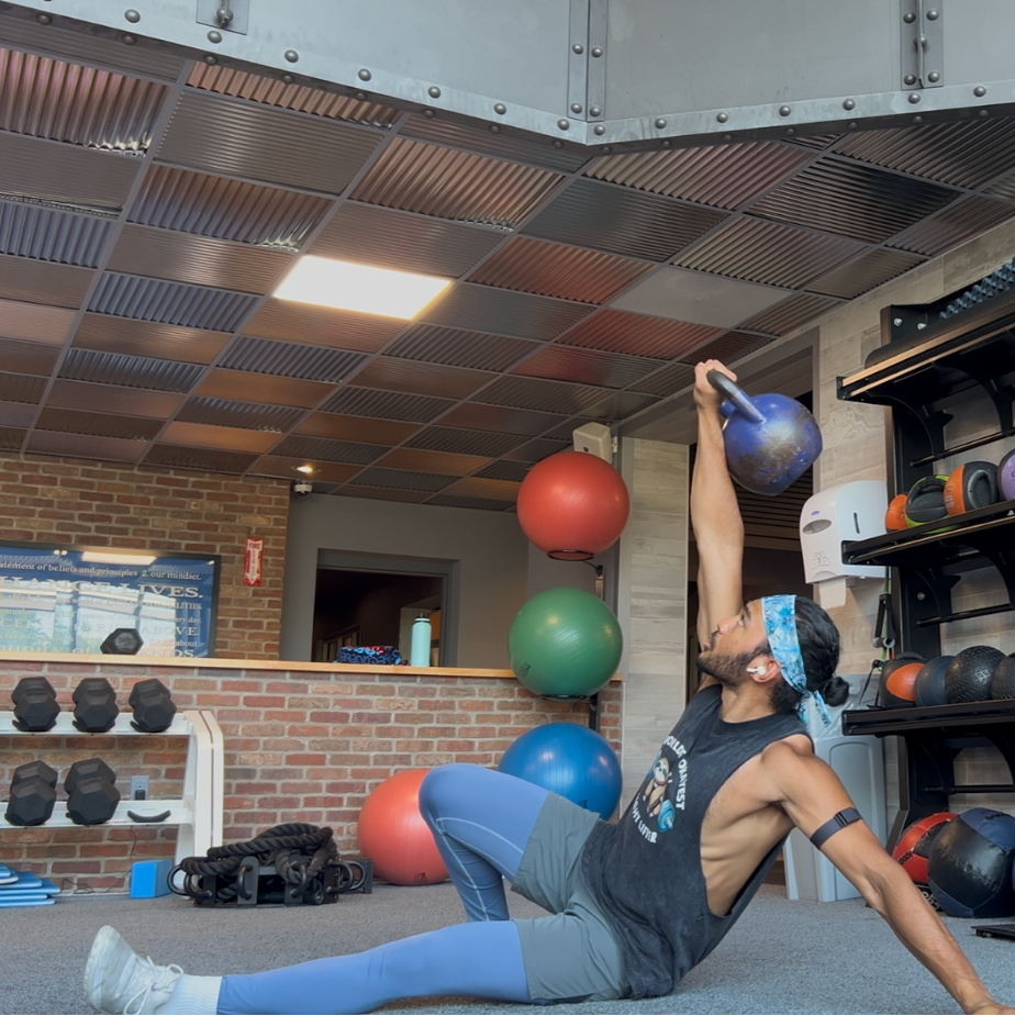 Man exercising with kettlebell