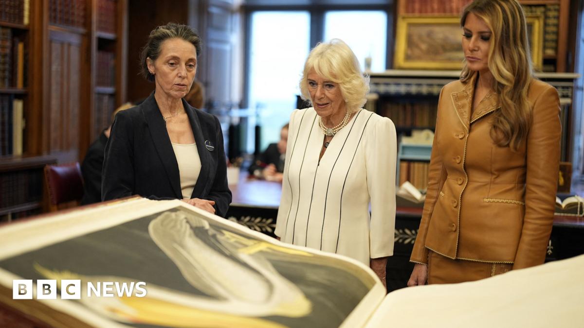 Queen Camilla and Melania Trump inspect a large book bearing an illustration of a pelican.