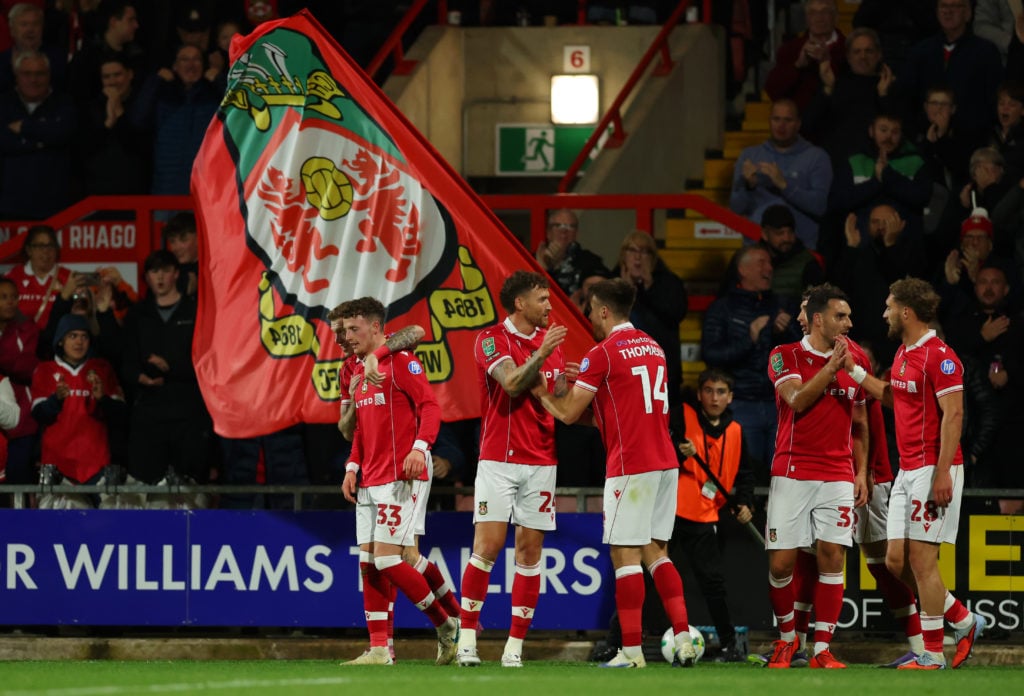 Nathan Broadhead celebrates after he scores his sides first goal during the Carabao Cup Third Round match between Wrexham and Reading