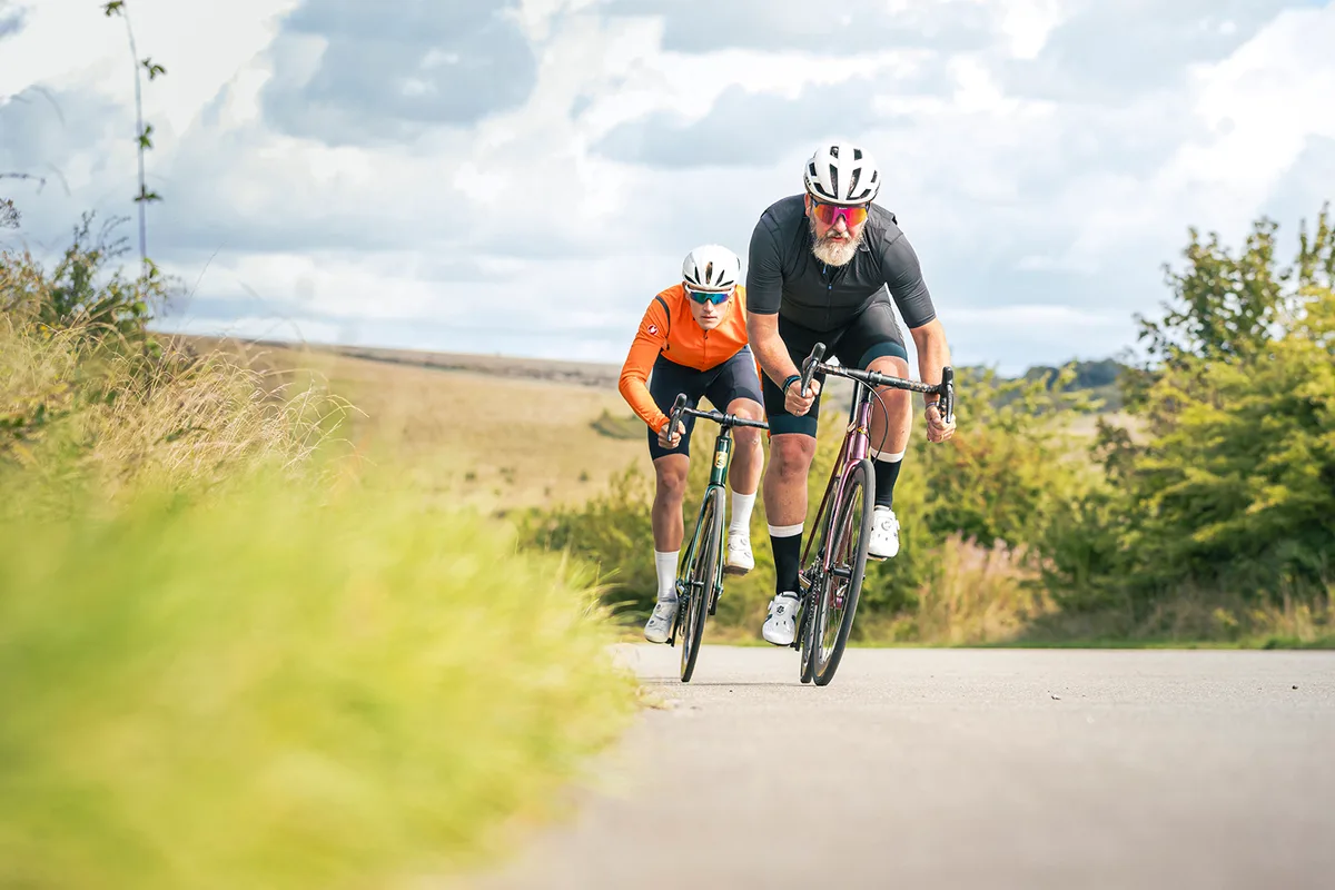 Two road cyclists on country road