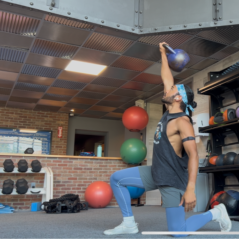 Man exercising with kettlebell