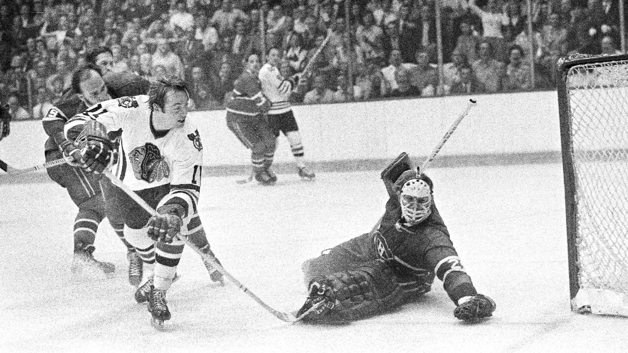 Montreal Canadiens goalie Ken Dryden makes a save off the stick of Boston Bruins Bob Schmautz, during their Stanley Cup hockey playoff game at Boston Garden, May 18, 1978. (AP)