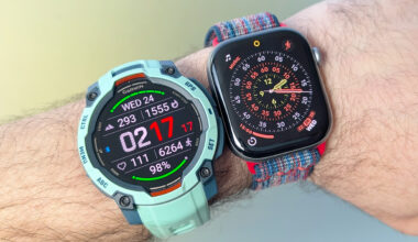 Close-up of the Garmin Instinct 3 next to the Apple Watch Series 11
