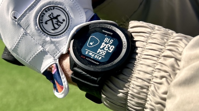 a photo of the Garmin Approach S12 with a golf glove