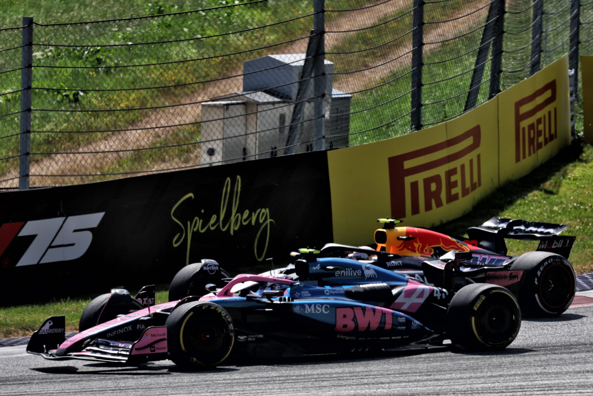 Franco Colapinto, Alpine, and Yuki Tsunoda, Red Bull, collide in F1's 2025 Austrian Grand Prix