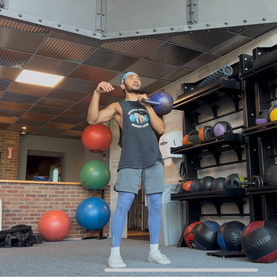 Man exercising with kettlebell
