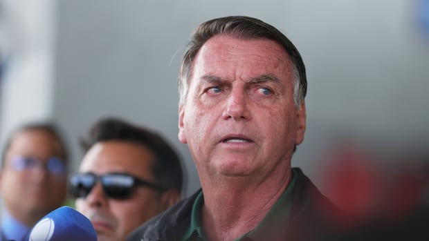 Former Brazilian president Jair Bolsonaro sentenced to more than 27 years in prison for plotting coup