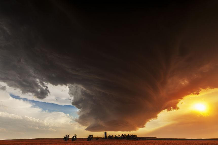 A giant stormcloud over a farm in Nebraska.