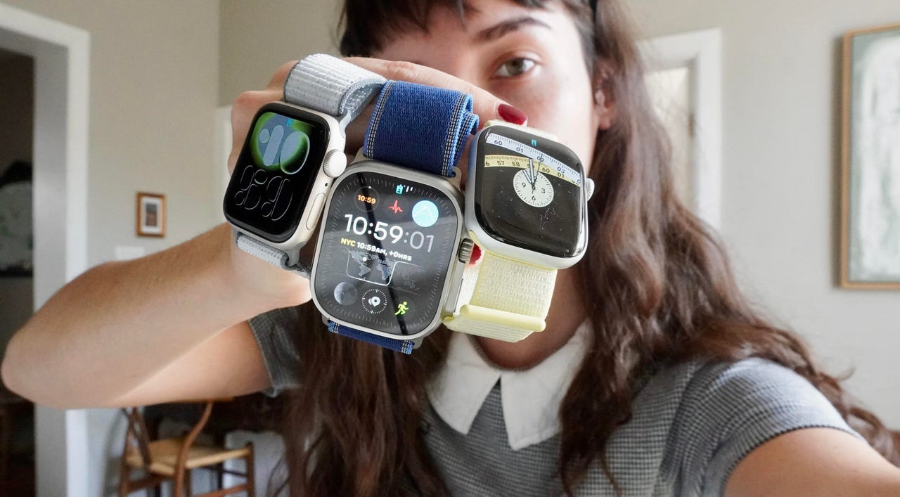 Apple Watches on hand