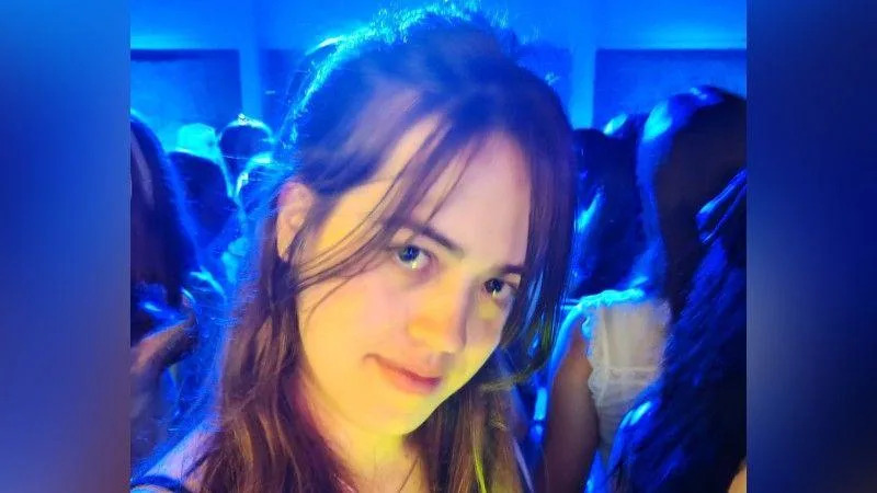 Image of Zara. She has brown hair. 