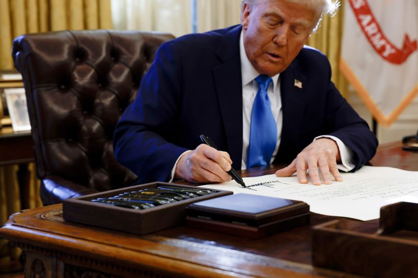 President Donald Trump signs executive orders withdrawing from the United Nations Relief and Works Agency for Palestine Refugees in the Near East and the United Nations Human Rights Council on February 4, 2025.