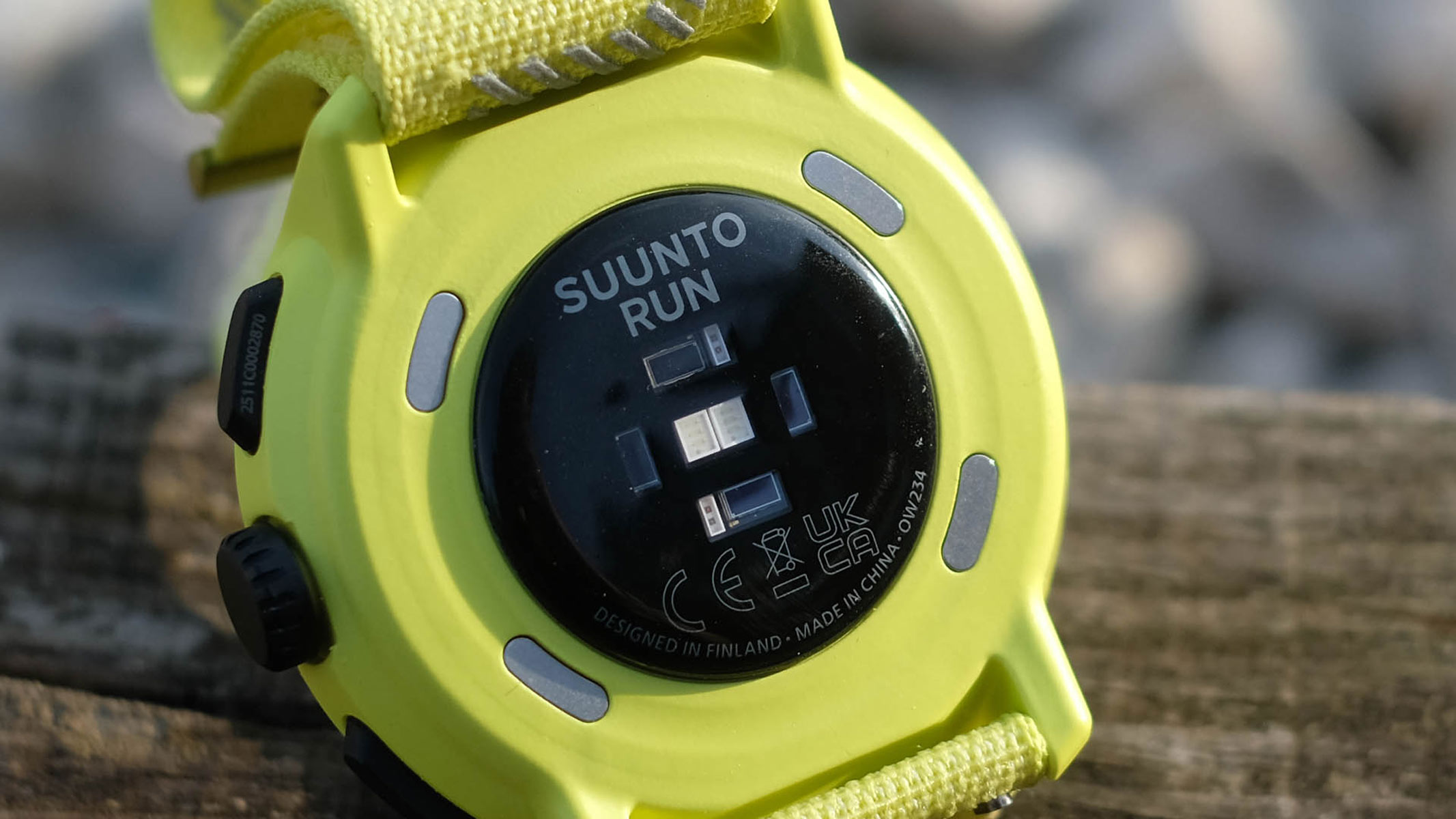A close-up picture of the heart rate sensor and side buttons in the Suunto Run watch