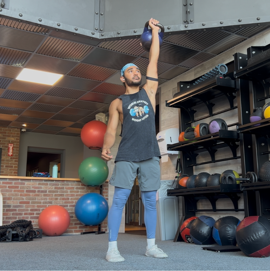 Man exercising with kettlebell