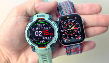 Close-up of the Garmin Instinct 3 next to the Apple Watch Series 11