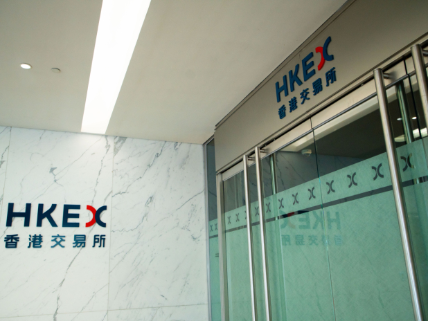 HK stocks climb amid cautious start to week in region