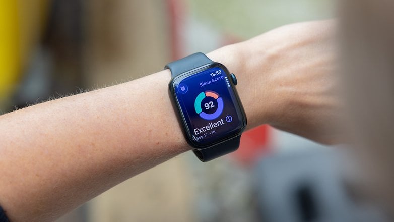 A close-up of a smartwatch displaying a sleep score of 92, labeled 'Excellent'.