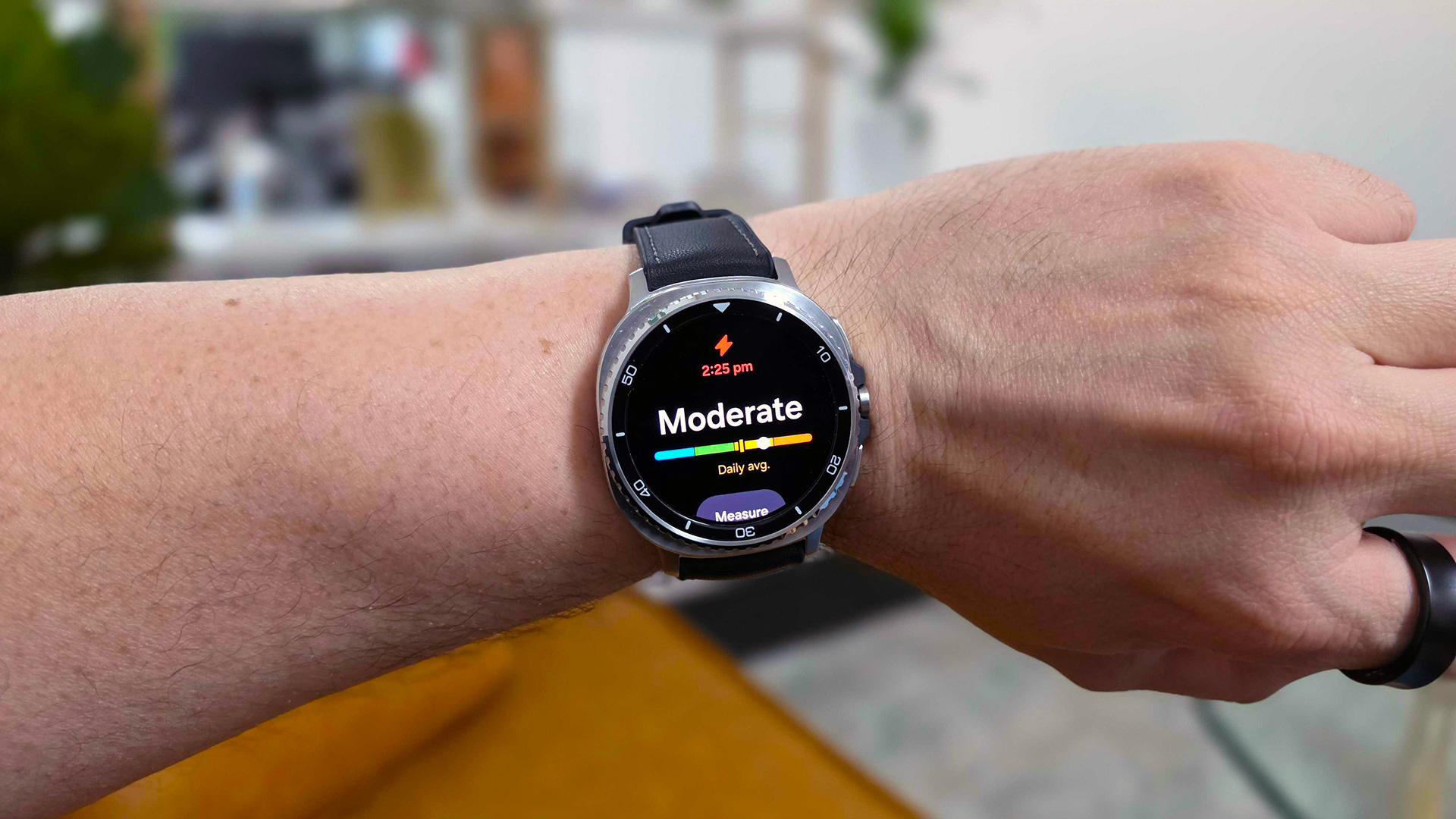 Samsung Galaxy Watch 8 Classic on wrist displaying stress level reading