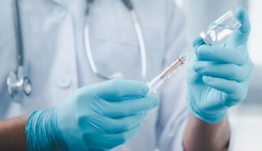 Minister defends Alberta's plan to charge some people for COVID-19 vaccines