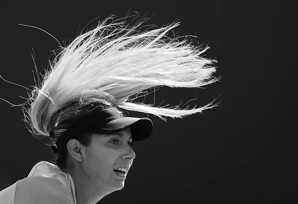 Oceane Dodin of France serves.