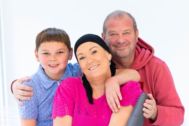 Paula with son Tony 11, and husband Mark Hudgell. 