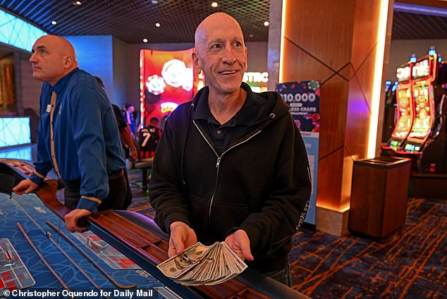 Daily Mail caught up with Contino as he hopped from craps table to craps table from the Bellagio to the Rio and way down to the Stratosphere (pictured)