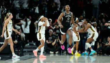 Las Vegas Aces guard Jackie Young (0) reacts after a play against the Indiana Fever during the second period in Game 5 of a WNBA basketball playoff semifinals series Tuesday, Sept. 30, 2025, in Las Vegas. (AP Photo/John Locher)